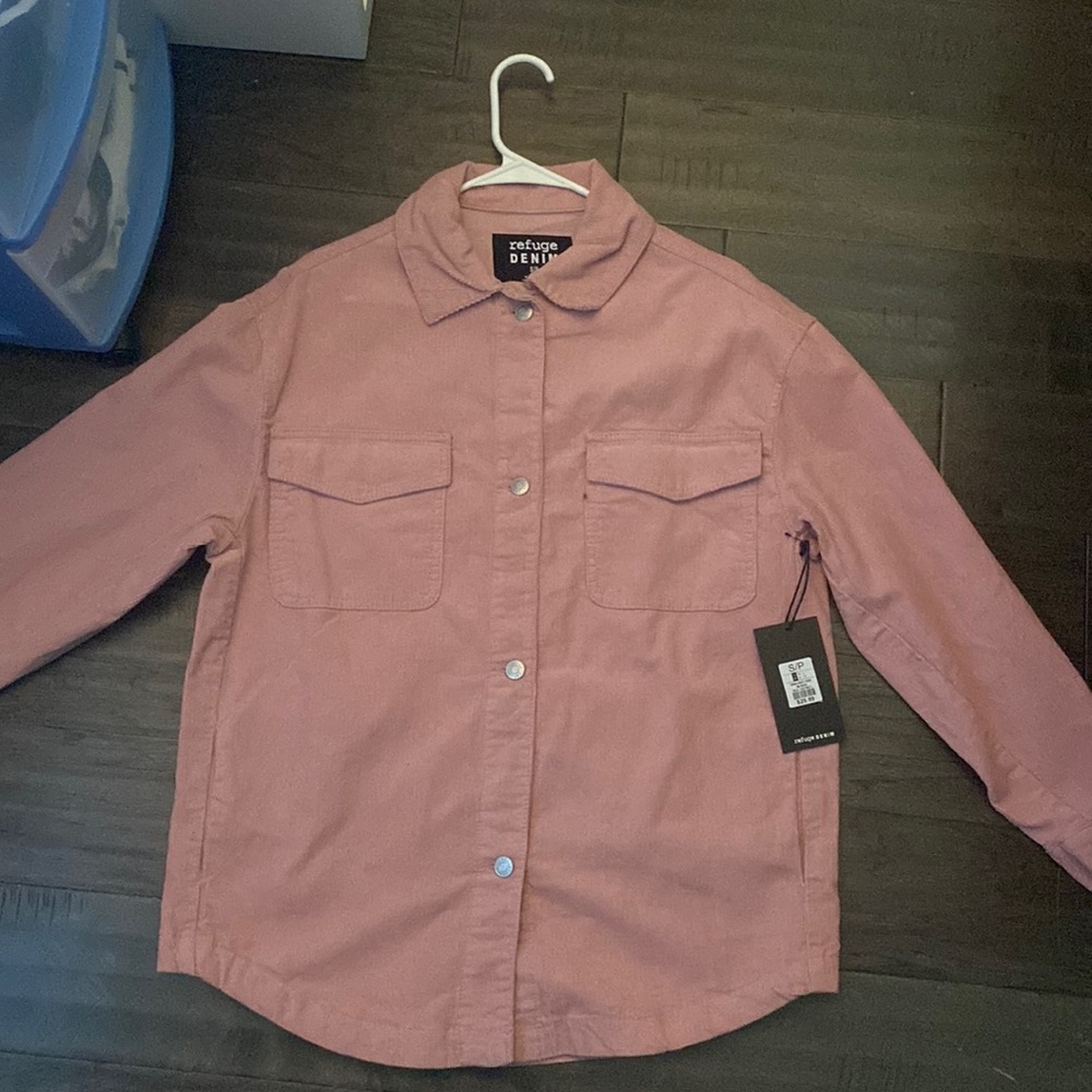 jacket, never worn, still has og tag